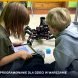 Półkolonie z robotyką i programowaniem w Tech Hero Academy — dzieci pracują nad robotem