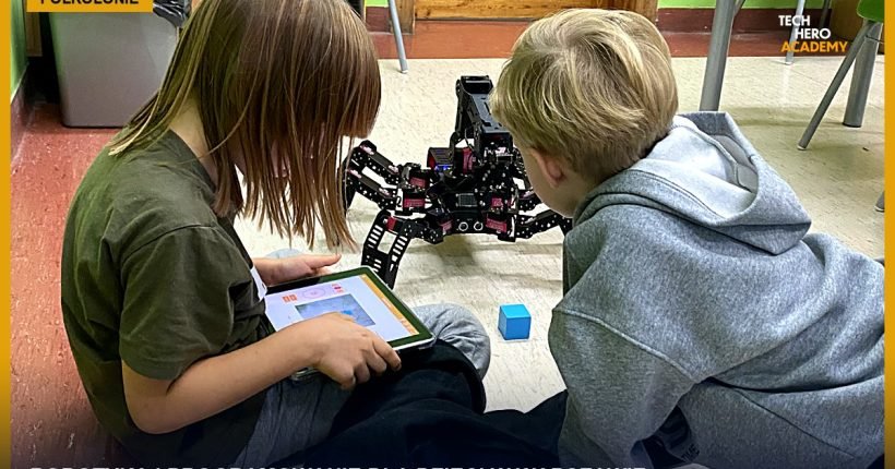 Półkolonie z robotyką i programowaniem w Tech Hero Academy — dzieci pracują nad robotem