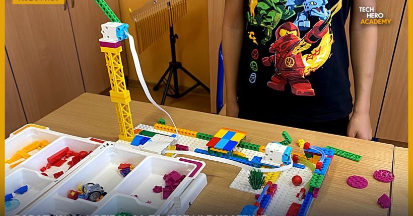 Dziecko przy konstrukcji LEGO robotyka z silnikiem i czujnikami w Tech Hero Academy