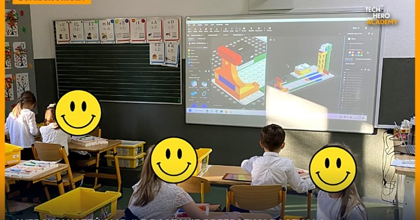 Uczniowie w klasie z tablicą interaktywną podczas zajęć z robotyki LEGO, ilustracja do artykułu o programie Cyfrowy Uczeń