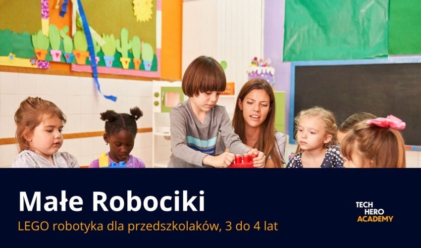 Przedszkolaki z nauczycielka przy klockach na zajeciach Male Robociki