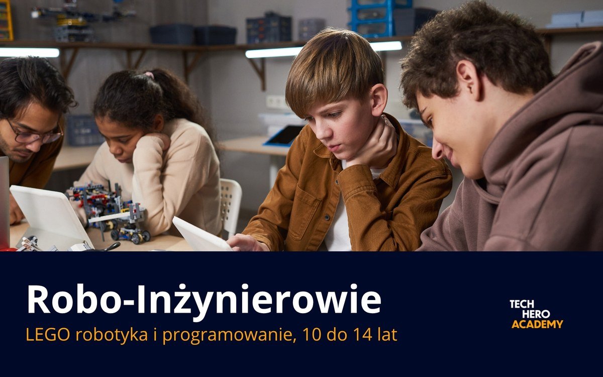 Uczniowie z trenerem przy robocie LEGO na zajeciach Robo-Inzynierowie